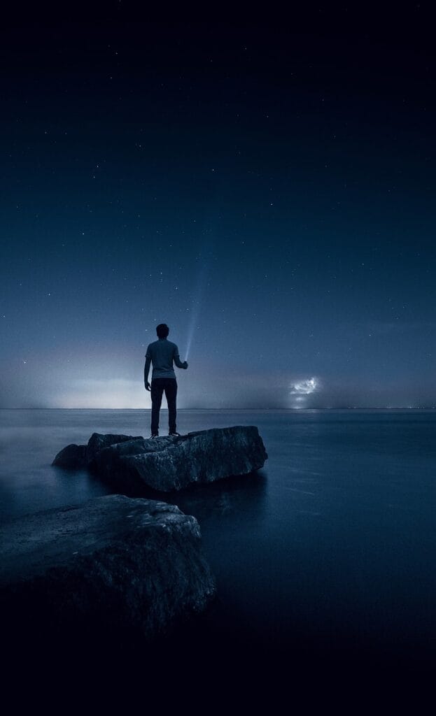 sea, ocean, water, nature, night, sky, stars, rocks, night sky, people, man, alone, blue alone, blue stars, blue night, blue rock